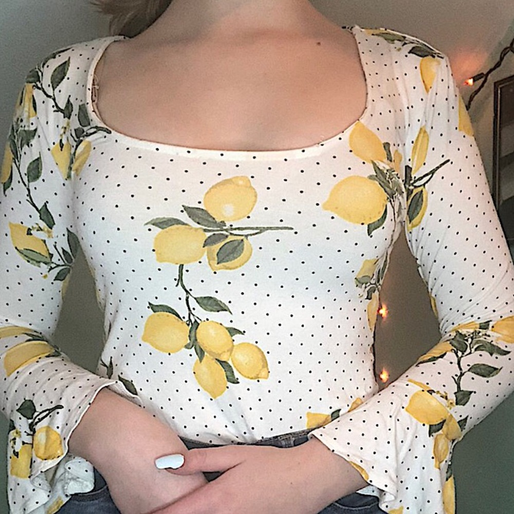 adorable lemon and polka dot body suit!